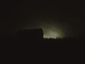 Low angle view of built structure at night