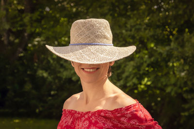 Smiling woman wearing hat