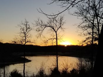 Scenic view of lake during sunset