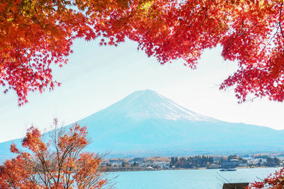 Scenic view of snowcapped mountains against sky during autumn