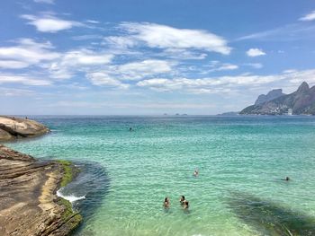 Scenic view of sea against cloudy sky