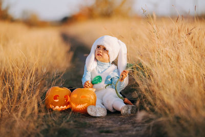 Full length of boy with toy on field