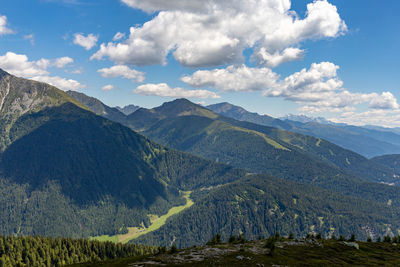 Panoramic view of landscape and mountains against sky