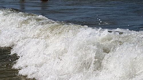 High angle view of waves in sea