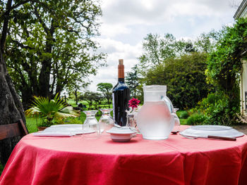 Wine bottles on table at restaurant