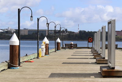 Pier over sea against sky