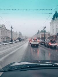 Cars on road in rain