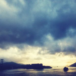 Scenic view of sea against cloudy sky