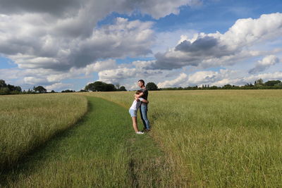 Full length of man on field against sky