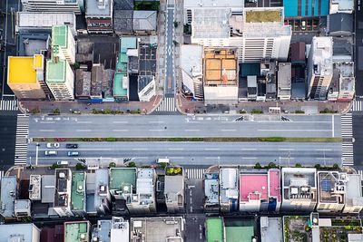 Aerial view of street amidst buildings in city