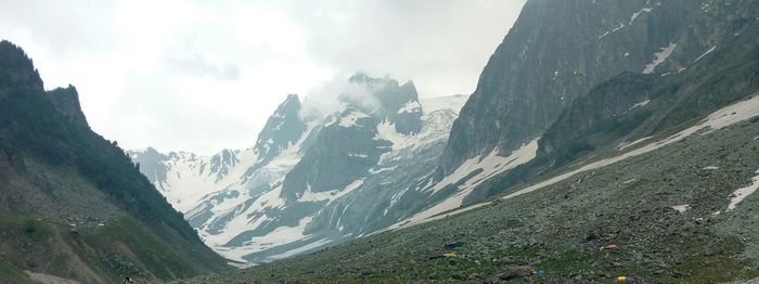 Panoramic view of mountains against sky