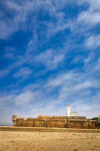 View of historical building against cloudy sky