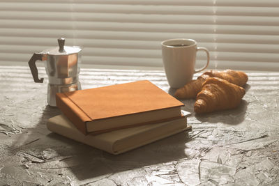 Close-up of coffee cup on table