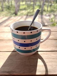 Close-up of coffee cup on table