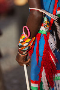 Close up of a turkana man wearing a traditional bead wristband