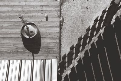 Low angle view of wooden hanging outdoors