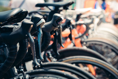 Close-up of bicycles parked in row