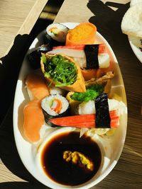 High angle view of sushi served on table