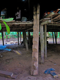 Empty chairs and table in building