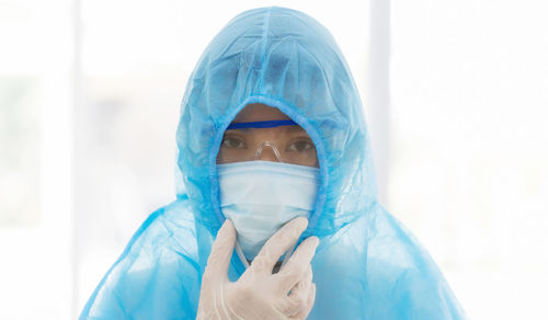 Portrait of man wearing mask