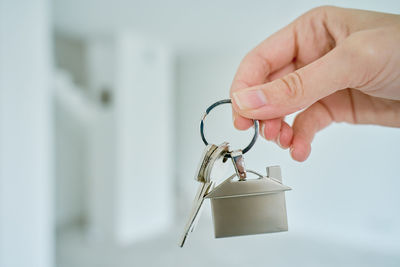Close-up of hand holding key