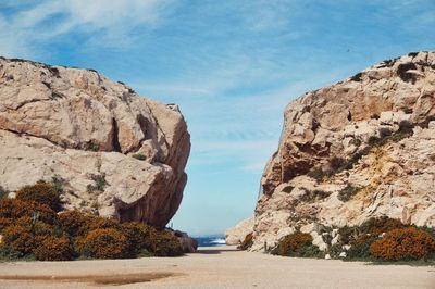 Scenic view of rock formation against sky