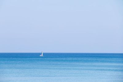 Boat sailing in sea