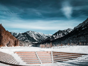 Scenic view of snowcapped mountains against sky