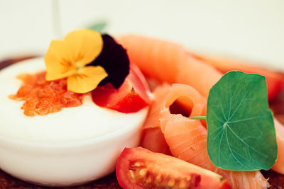 Close-up of orange fruits in plate