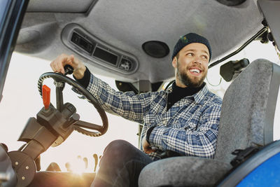 Smiling man driving