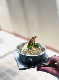 Close-up of person holding food