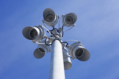 Low angle view of street light against sky