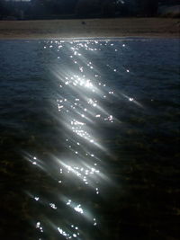 Scenic view of sea against sky at night