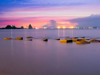 Scenic view of sea against sky at sunset