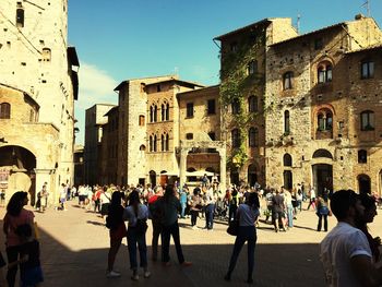 Group of people in front of historical building