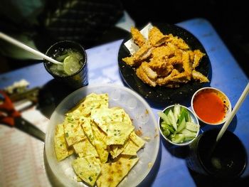 Close-up of food served on table