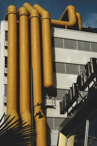 Low angle view of modern building against sky