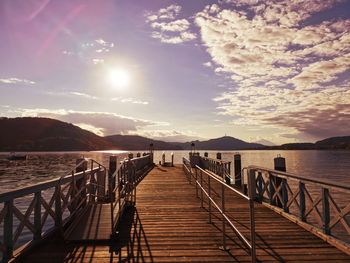 Pier over sea against sky