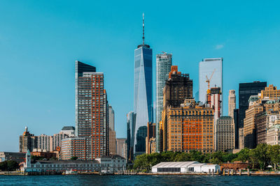 Modern buildings against sky in city