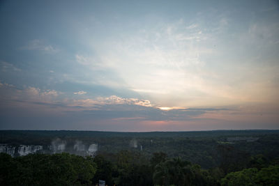 Scenic view of landscape against sky during sunset