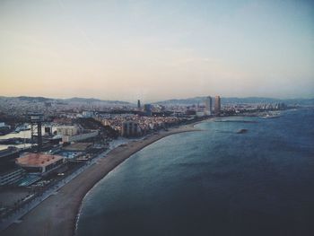 High angle view of buildings against sky during sunset