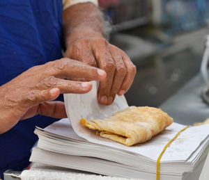 Close-up of man working on table