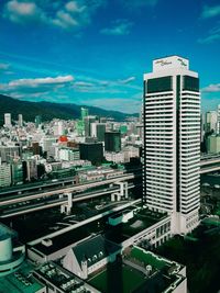 Cityscape against blue sky