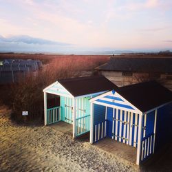 High angle view of beach huts against sky