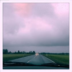 Road seen through car window