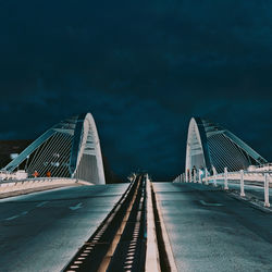 View of bridge against cloudy sky