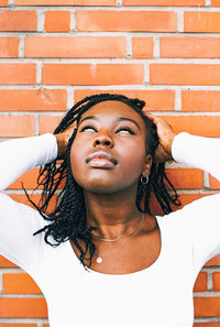 Close-up of young woman with braided hair