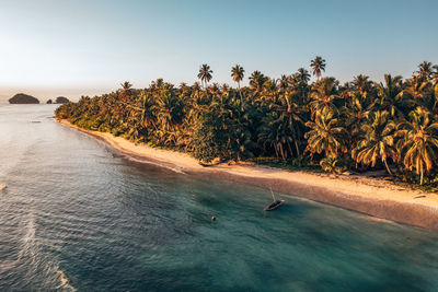 Scenic view of sea against clear sky