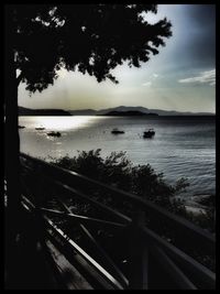 Scenic view of sea against sky at sunset