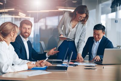 Business colleagues working in office